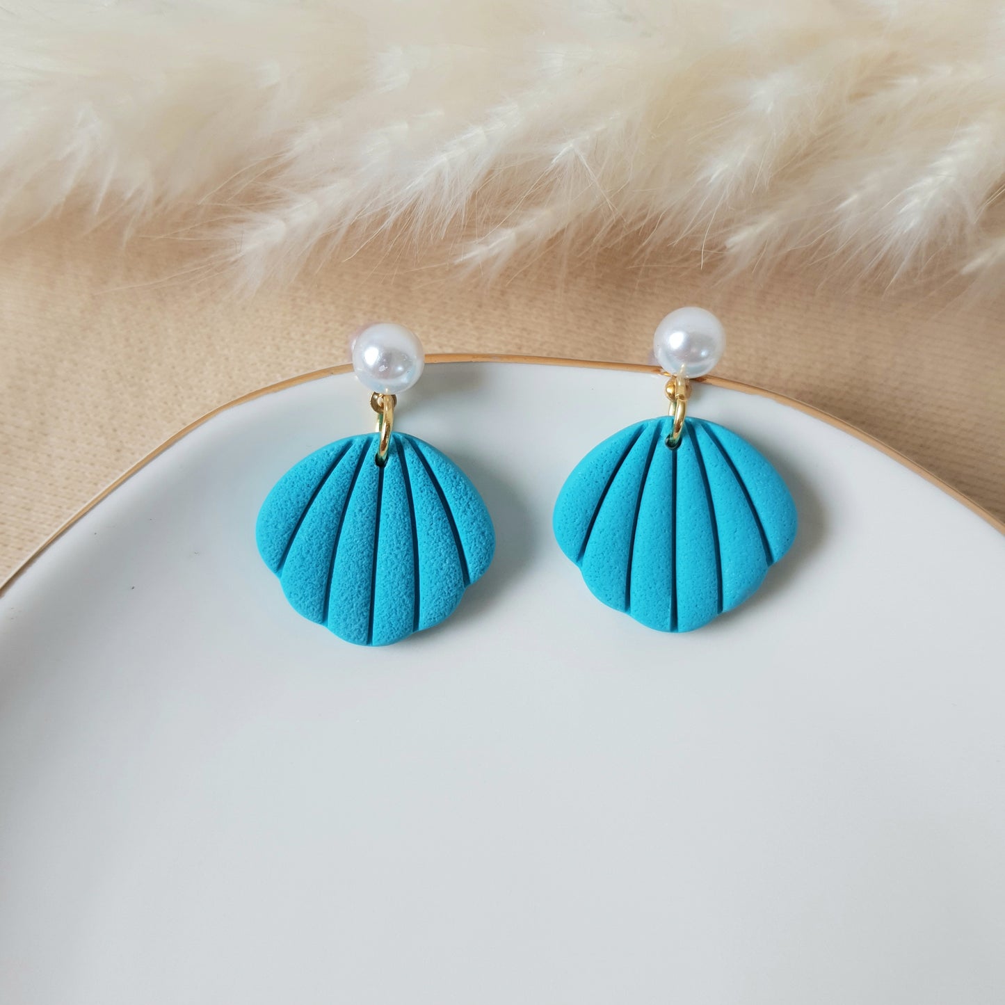 Turquoise shell with pearl