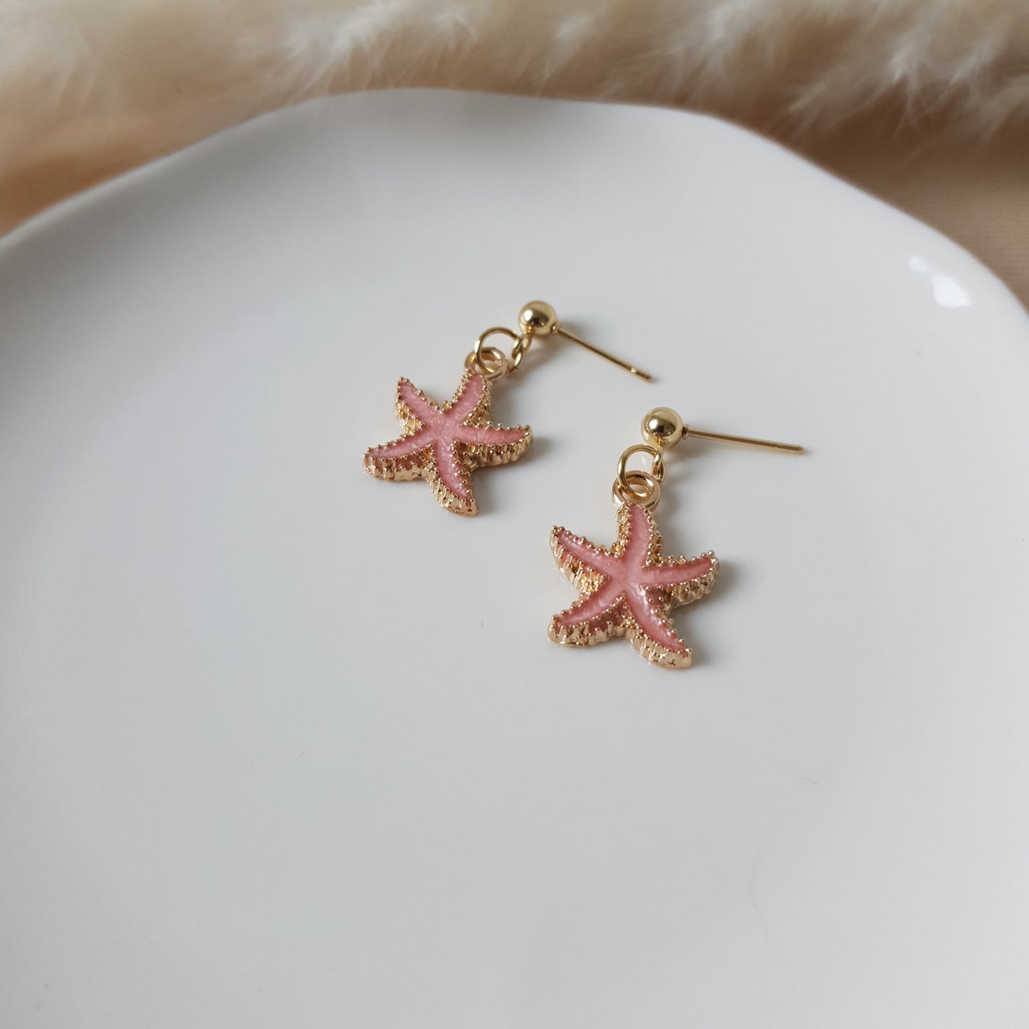 Pink sea star earrings