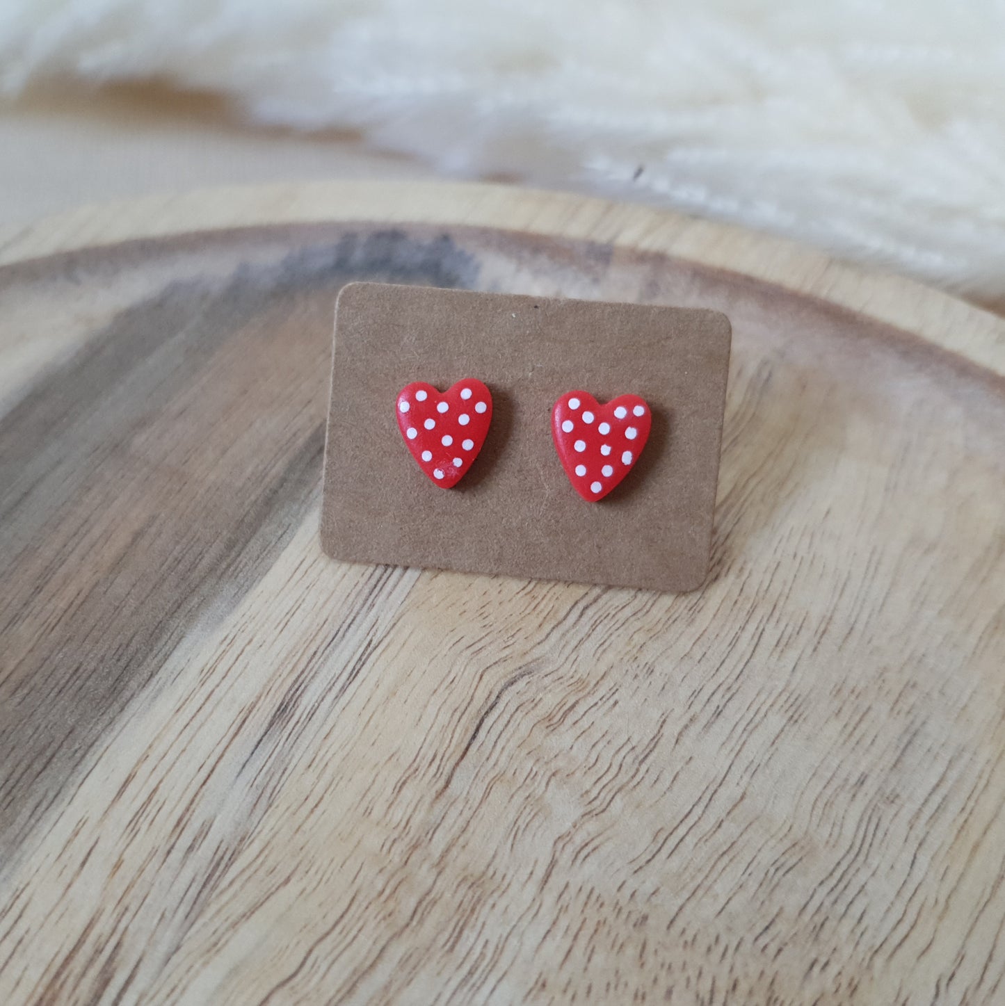 Small spotted red hearts