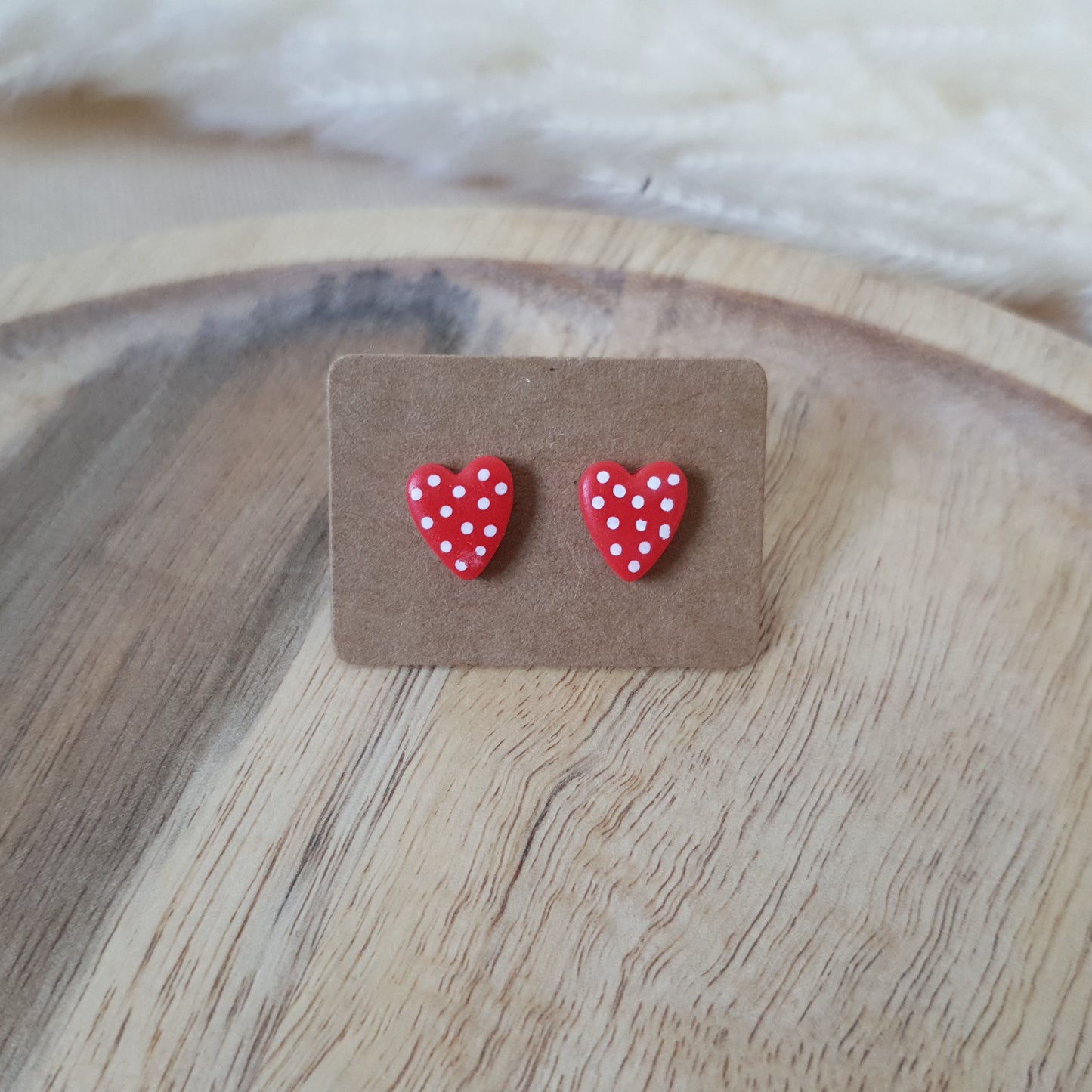 Small spotted red hearts