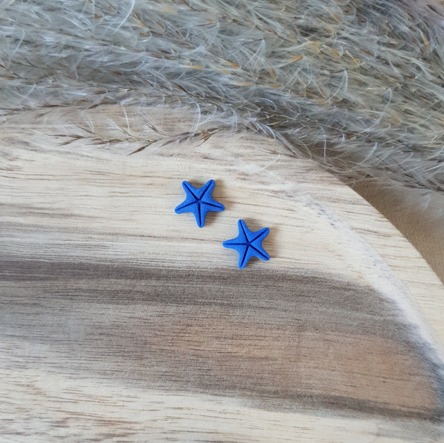 Elegant blue sea star studs