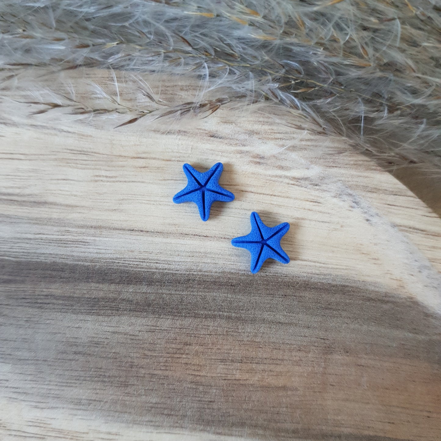 Elegant blue sea star studs