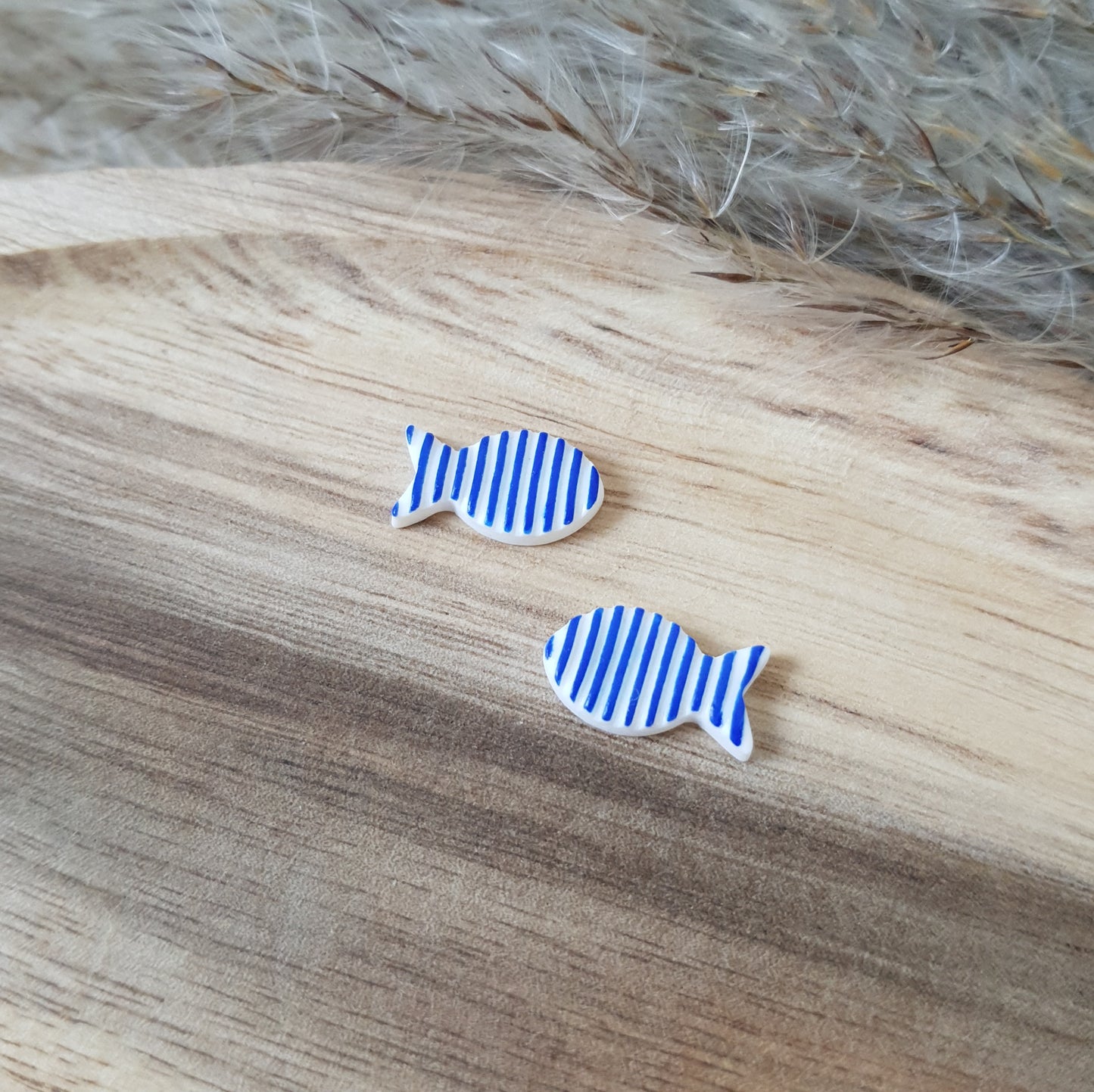 Striped fish stud earrings