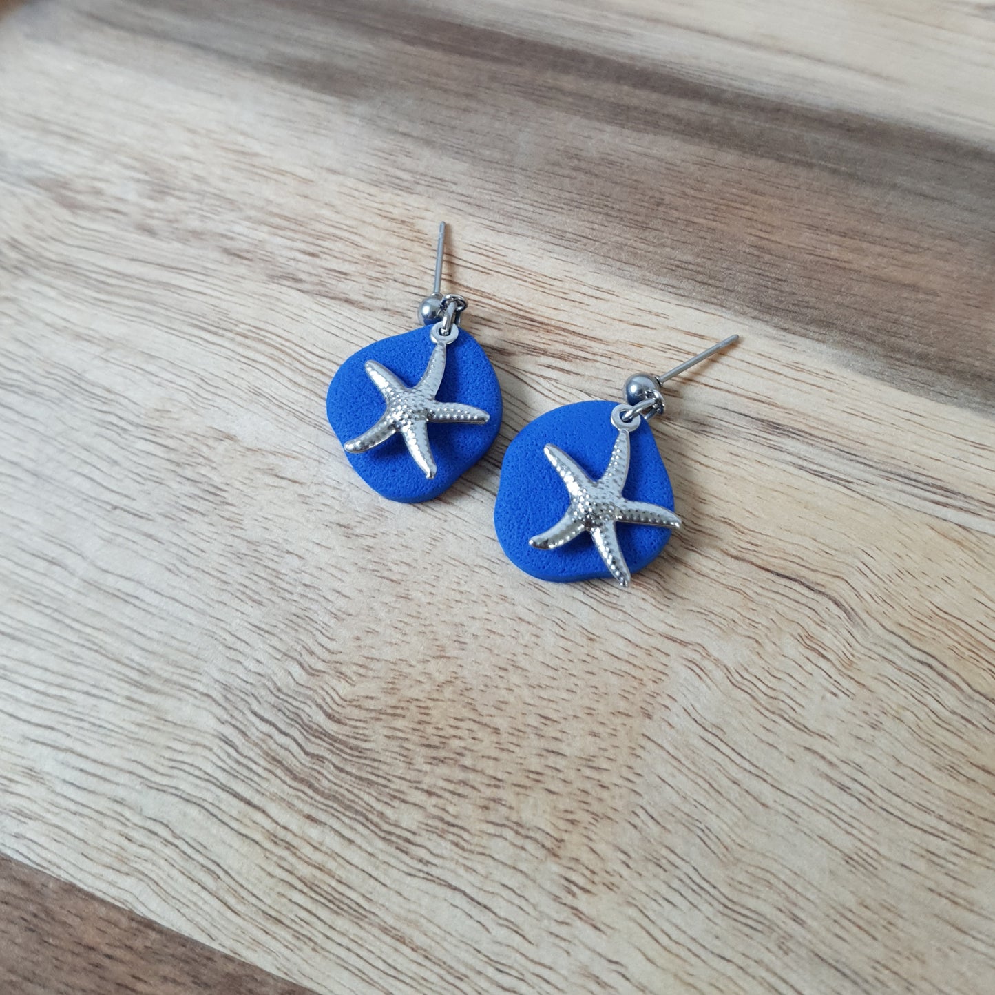 Silver sea stars dangles