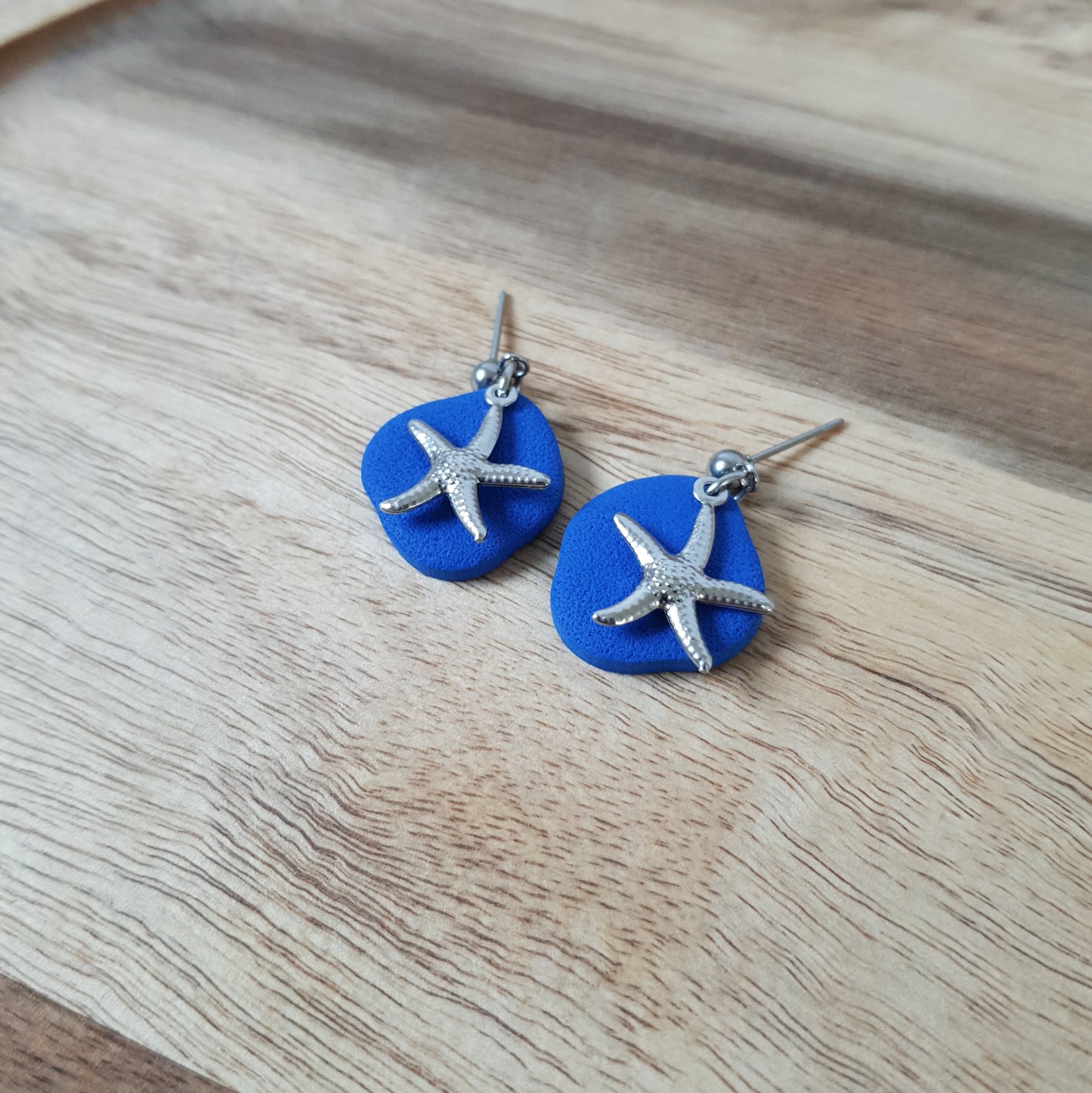 Silver sea stars dangles