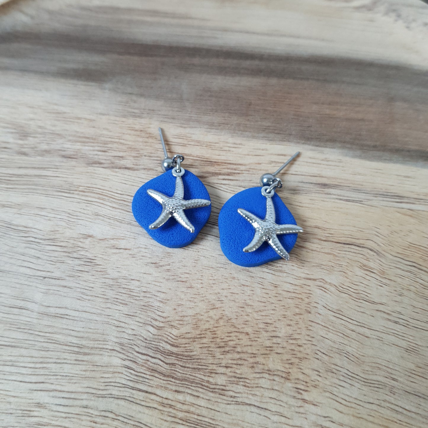 Silver sea stars dangles