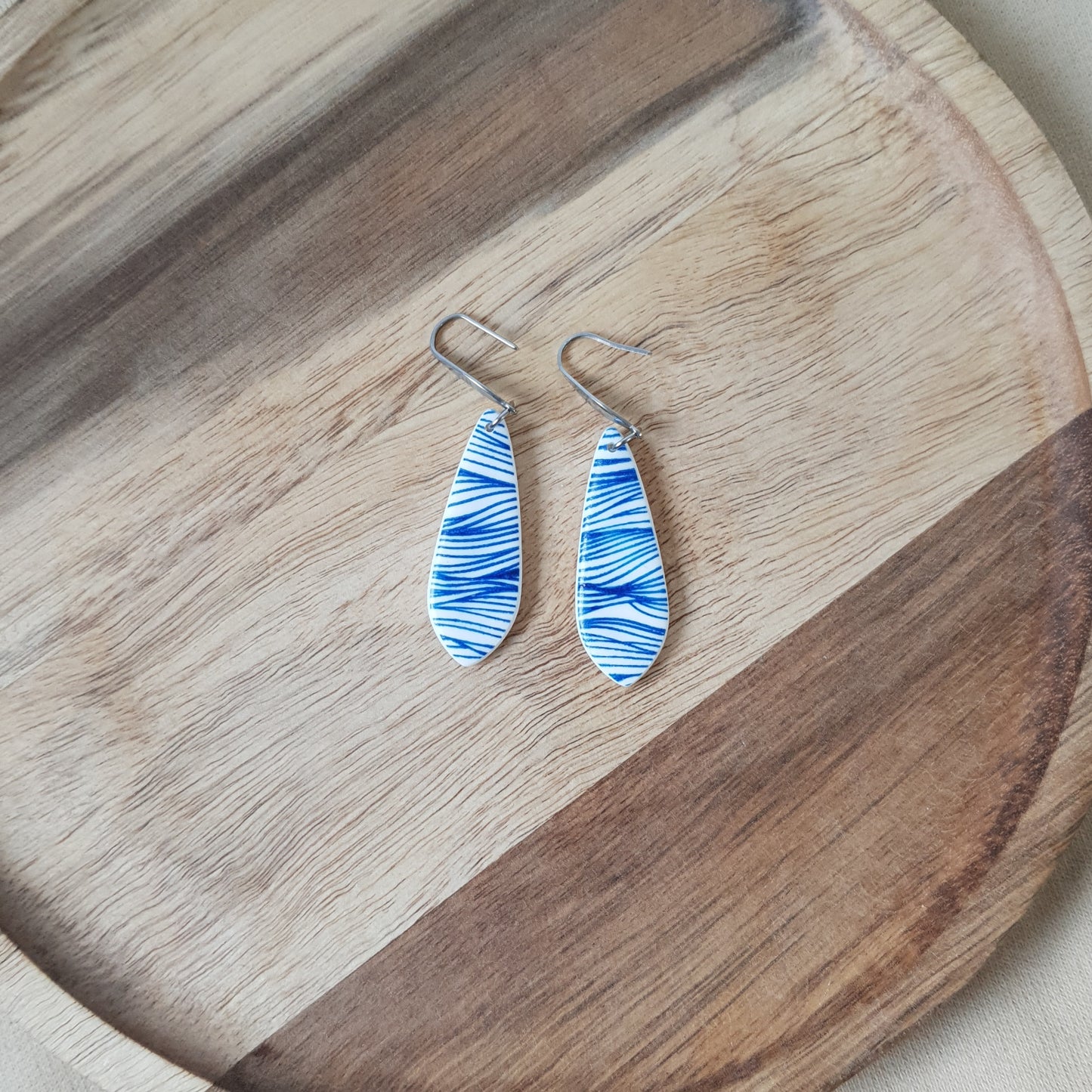 Blue waves dangle earrings