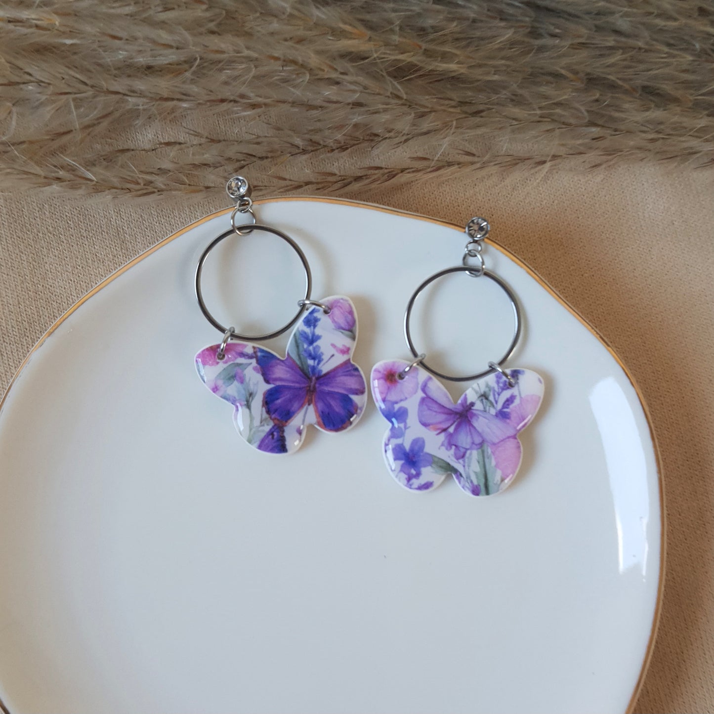 Violet butterfly dangle earrings