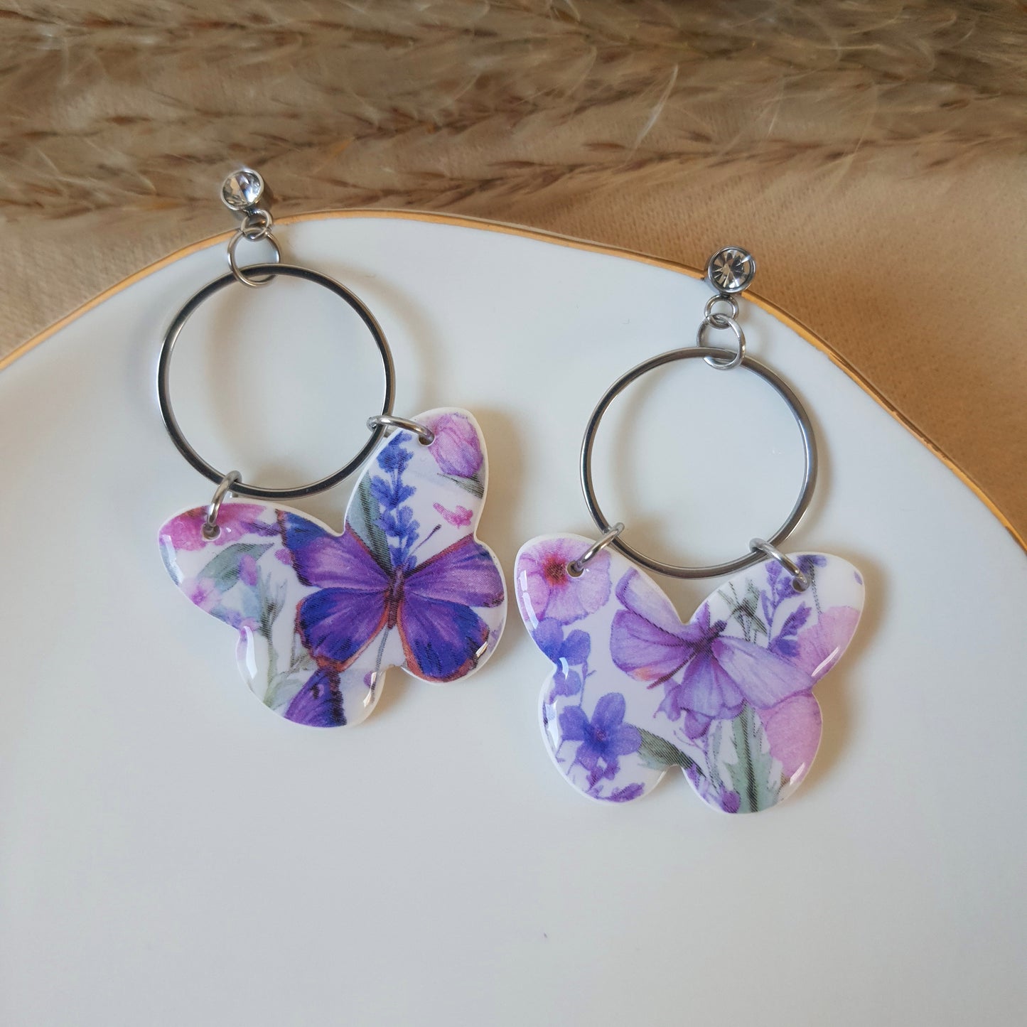 Violet butterfly dangle earrings