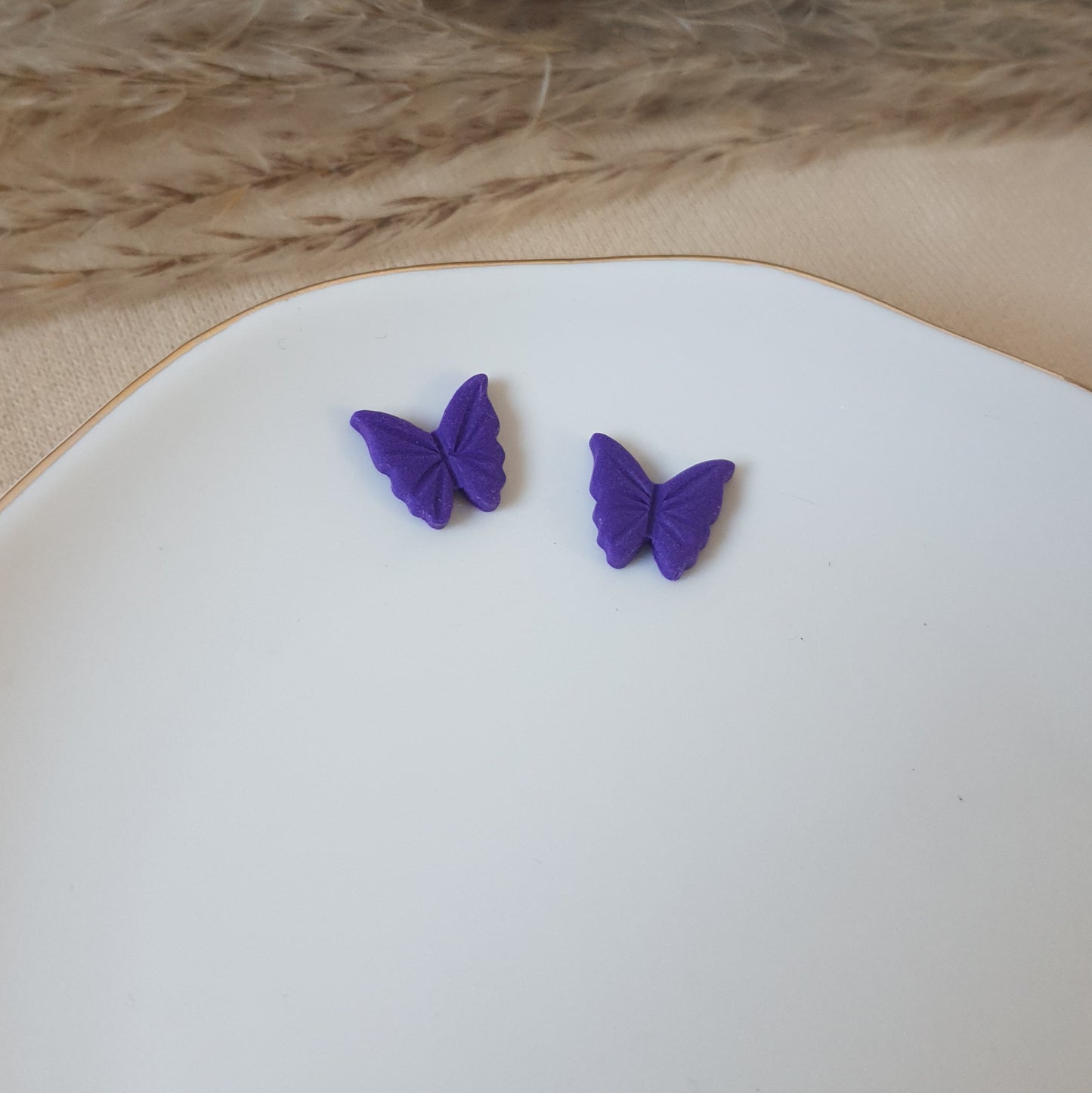 Purple butterfly studs