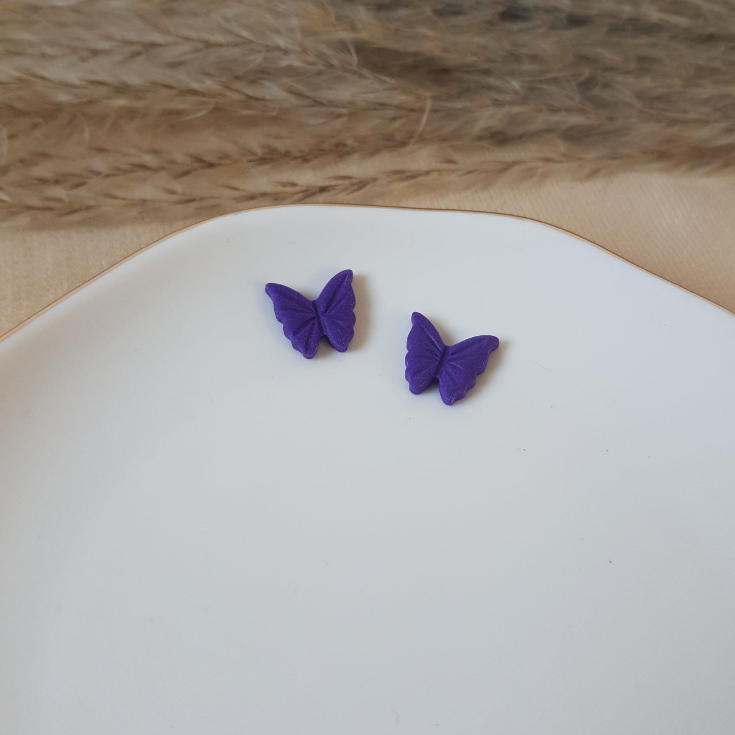 Purple butterfly studs