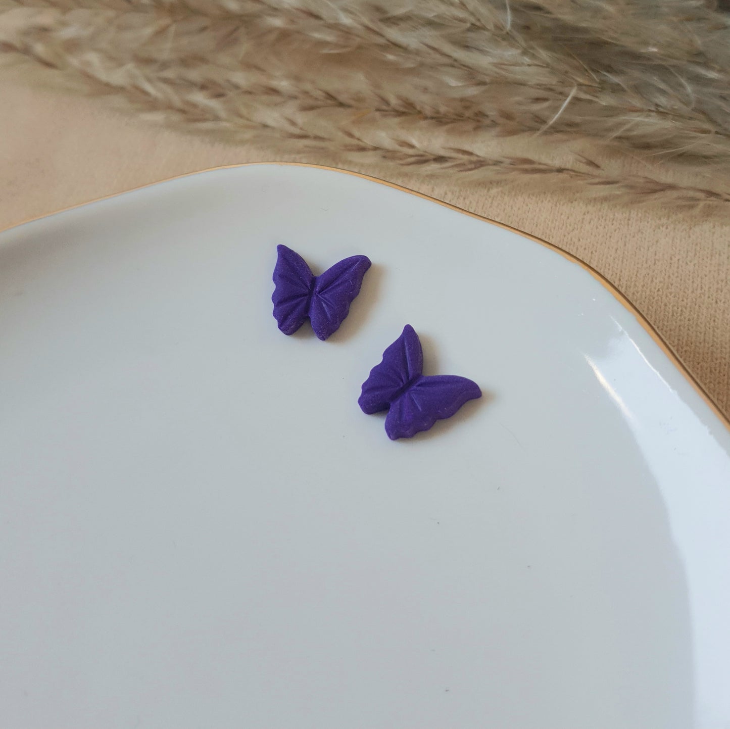 Purple butterfly studs