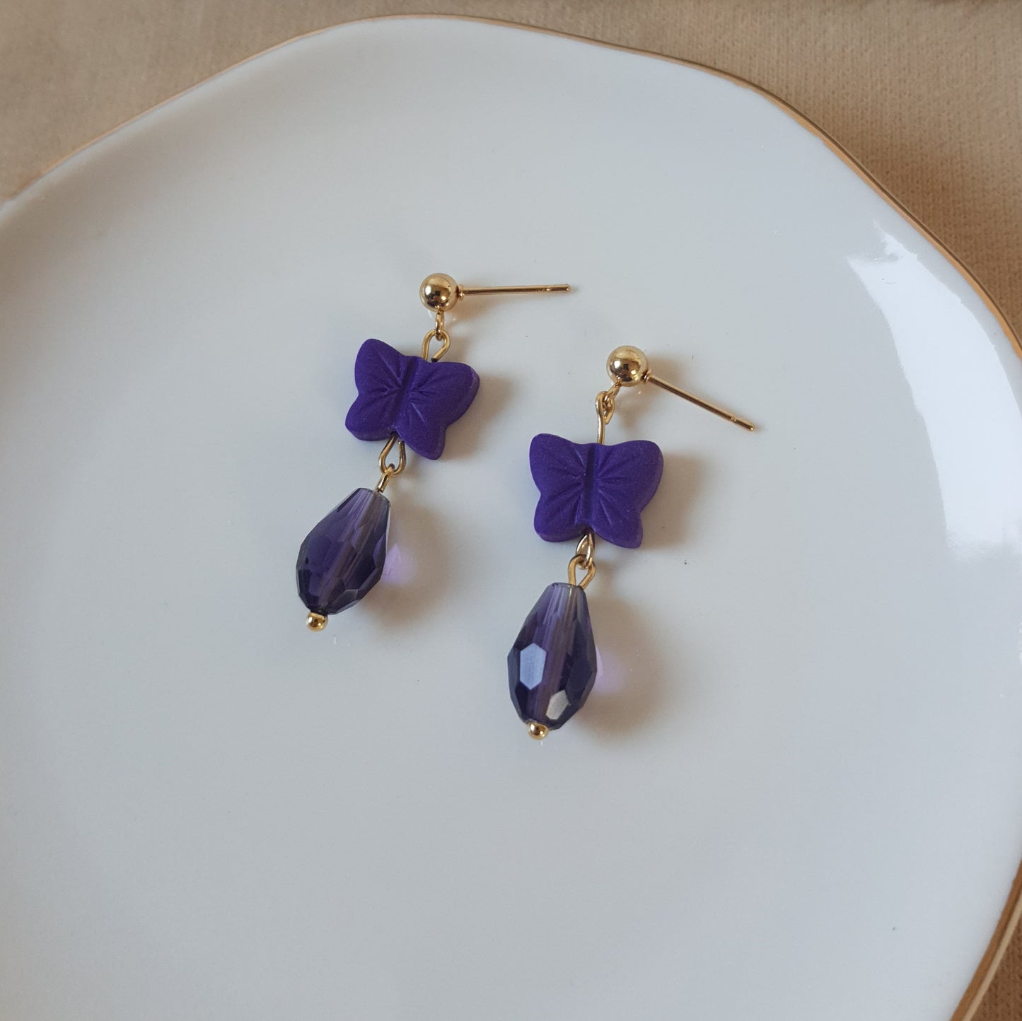 Dark purple butterfly dangle earrings