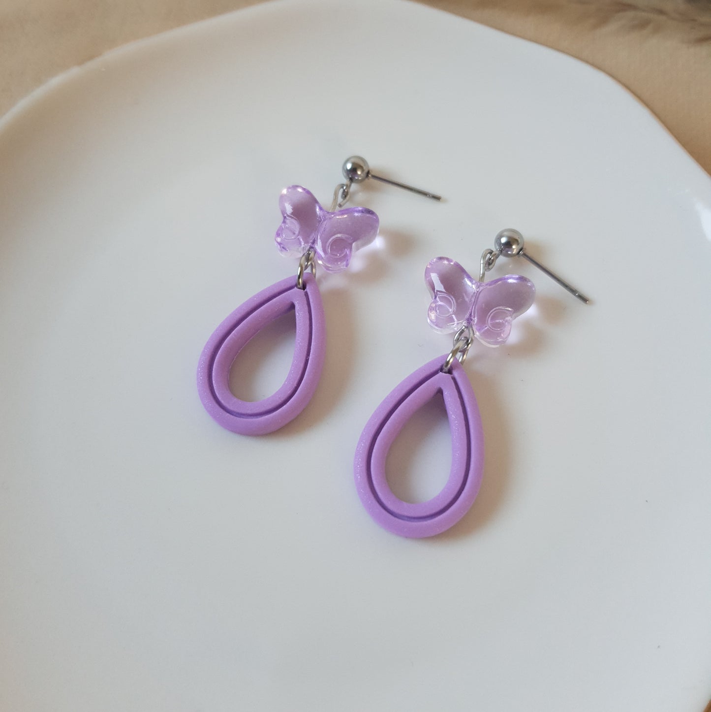 Lilac butterfly drops