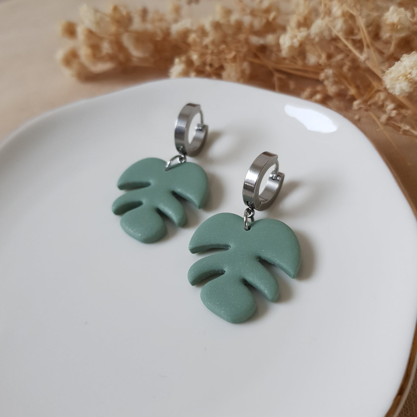 Sage monstera leaf earrings