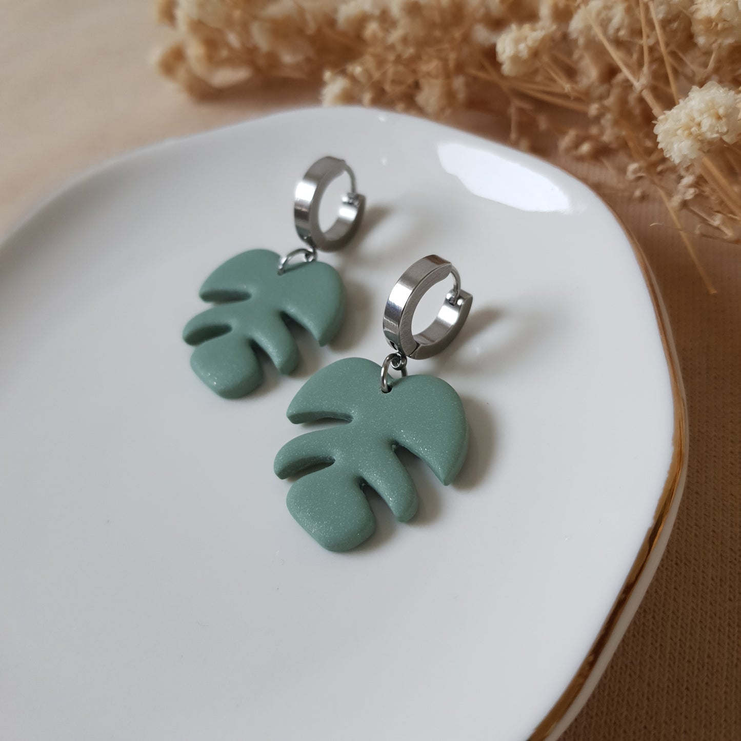 Sage monstera leaf earrings