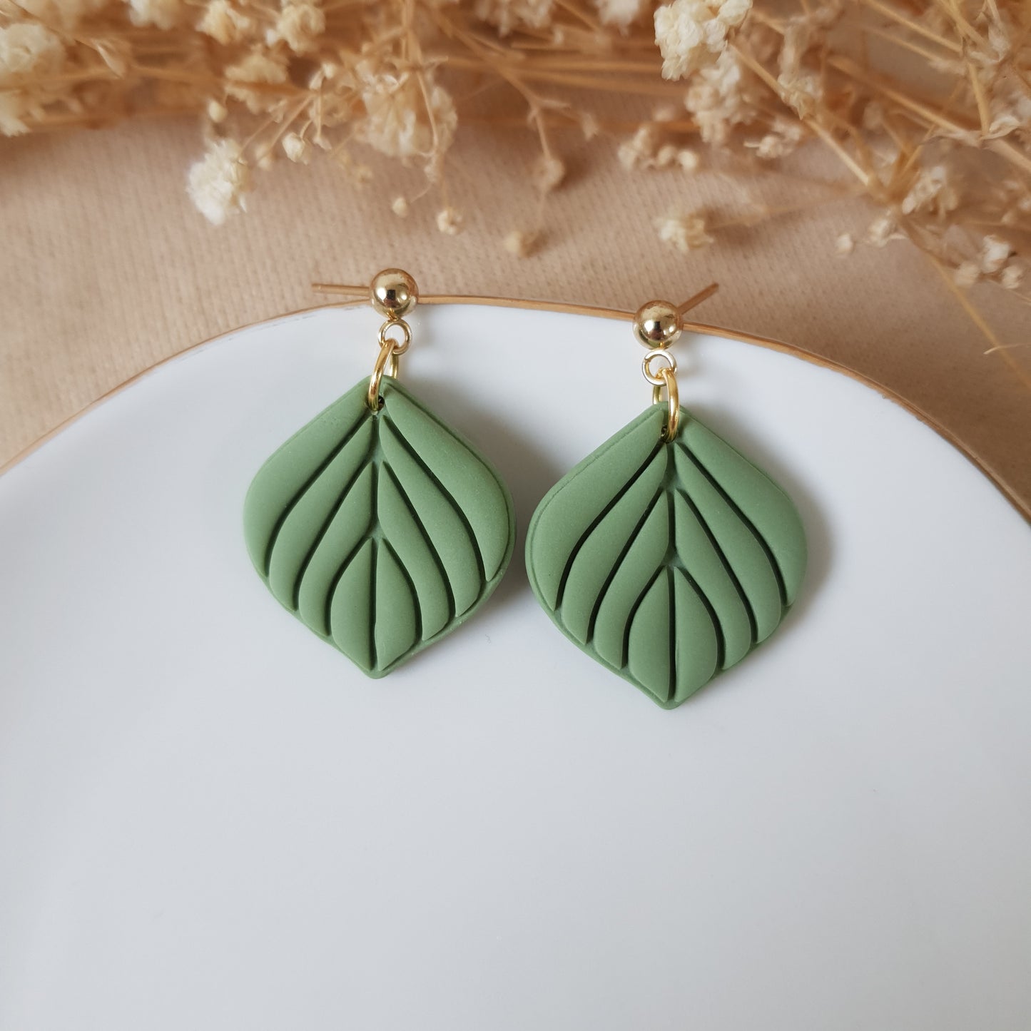 Green leaf dangle earrings