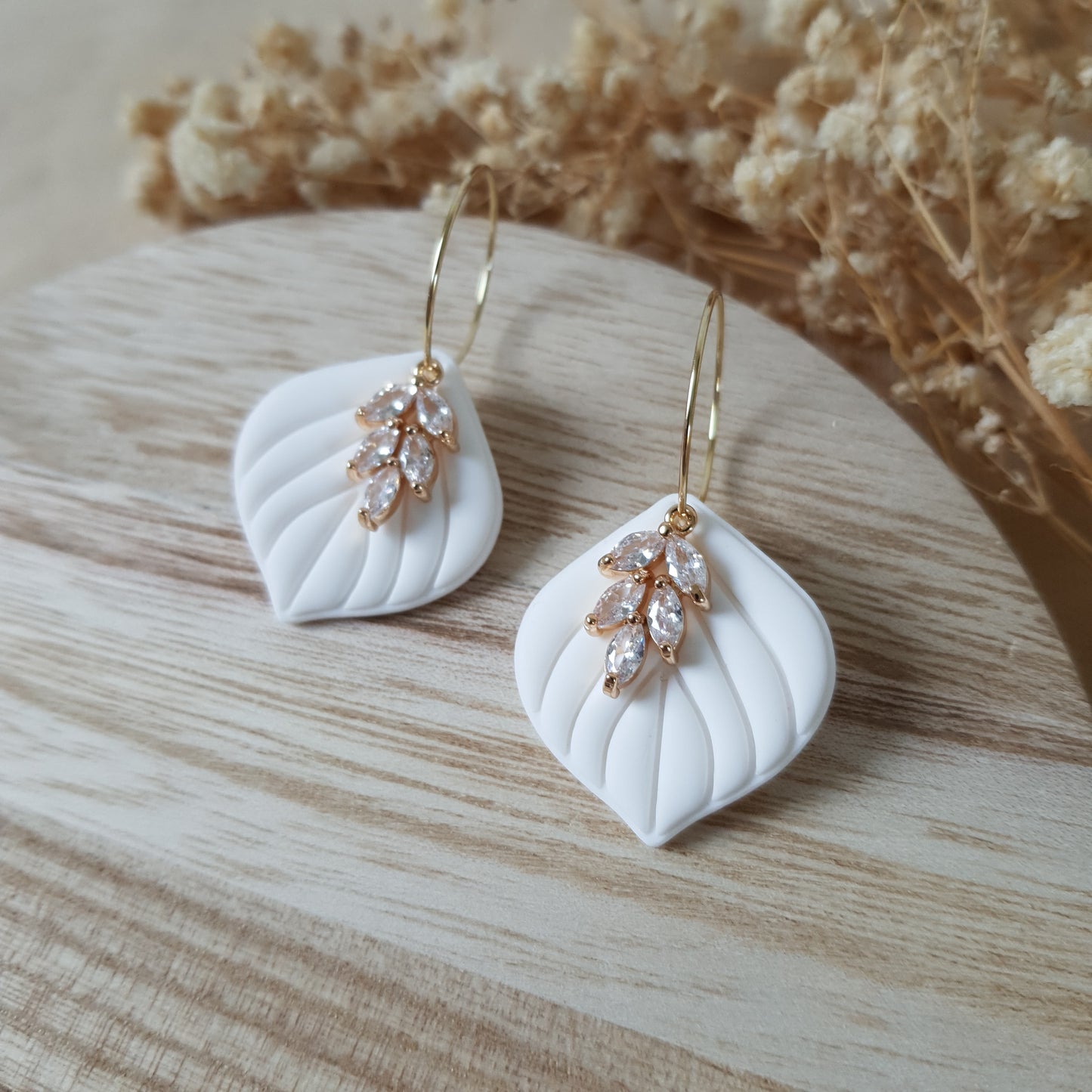 White leaf hoop earrings