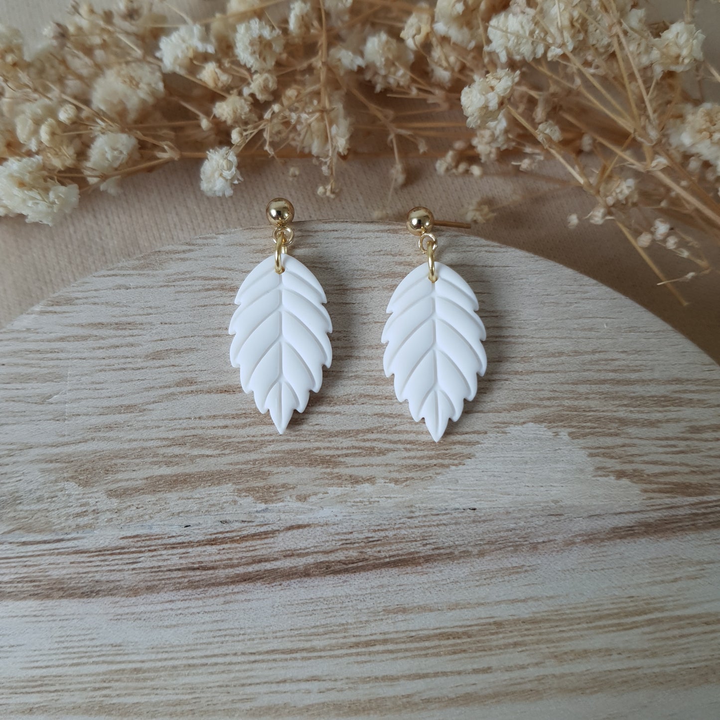Small white apple leaf earrings