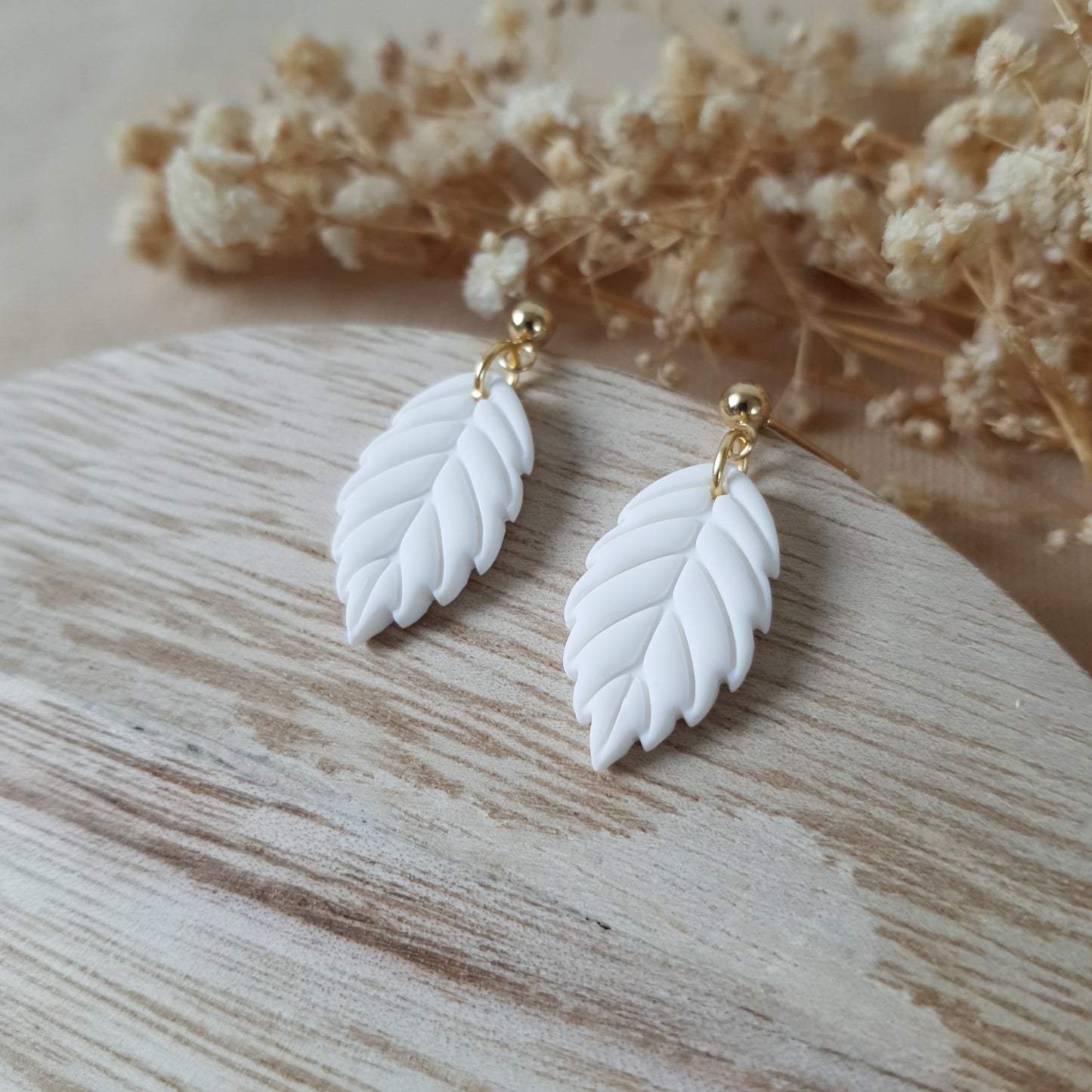 Small white apple leaf earrings