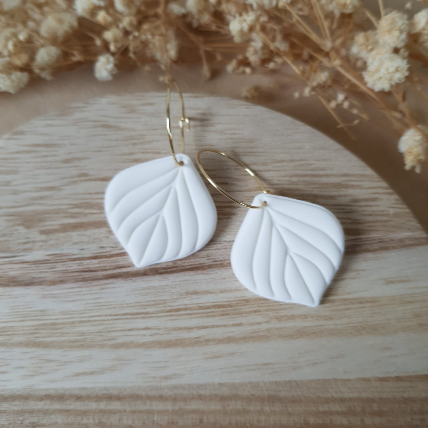White leaf hoop earrings