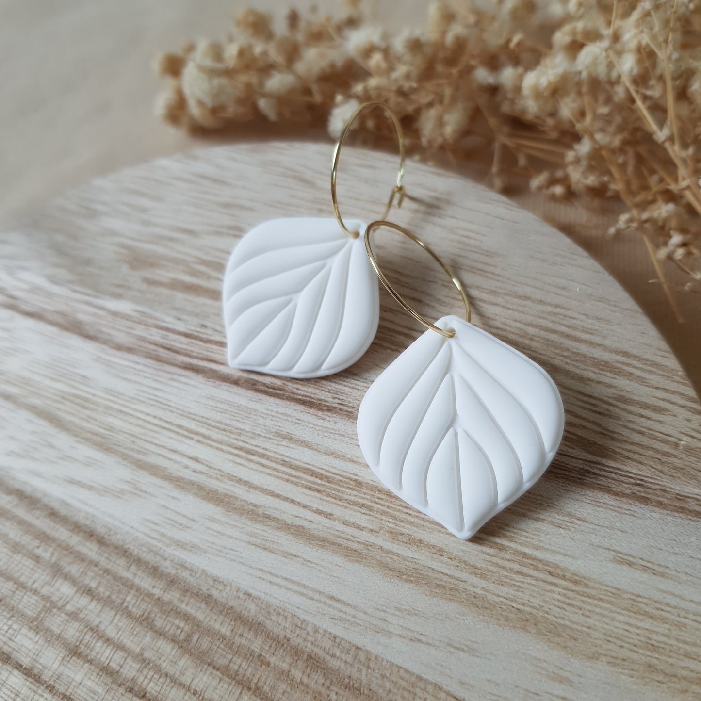White leaf hoop earrings