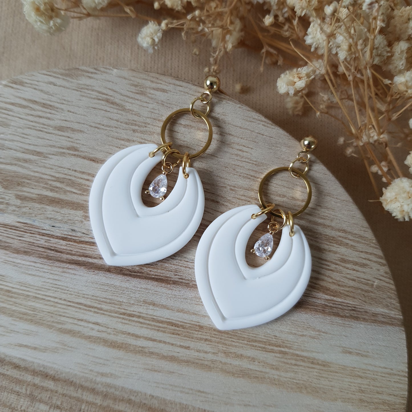 Elegant white dangle earrings