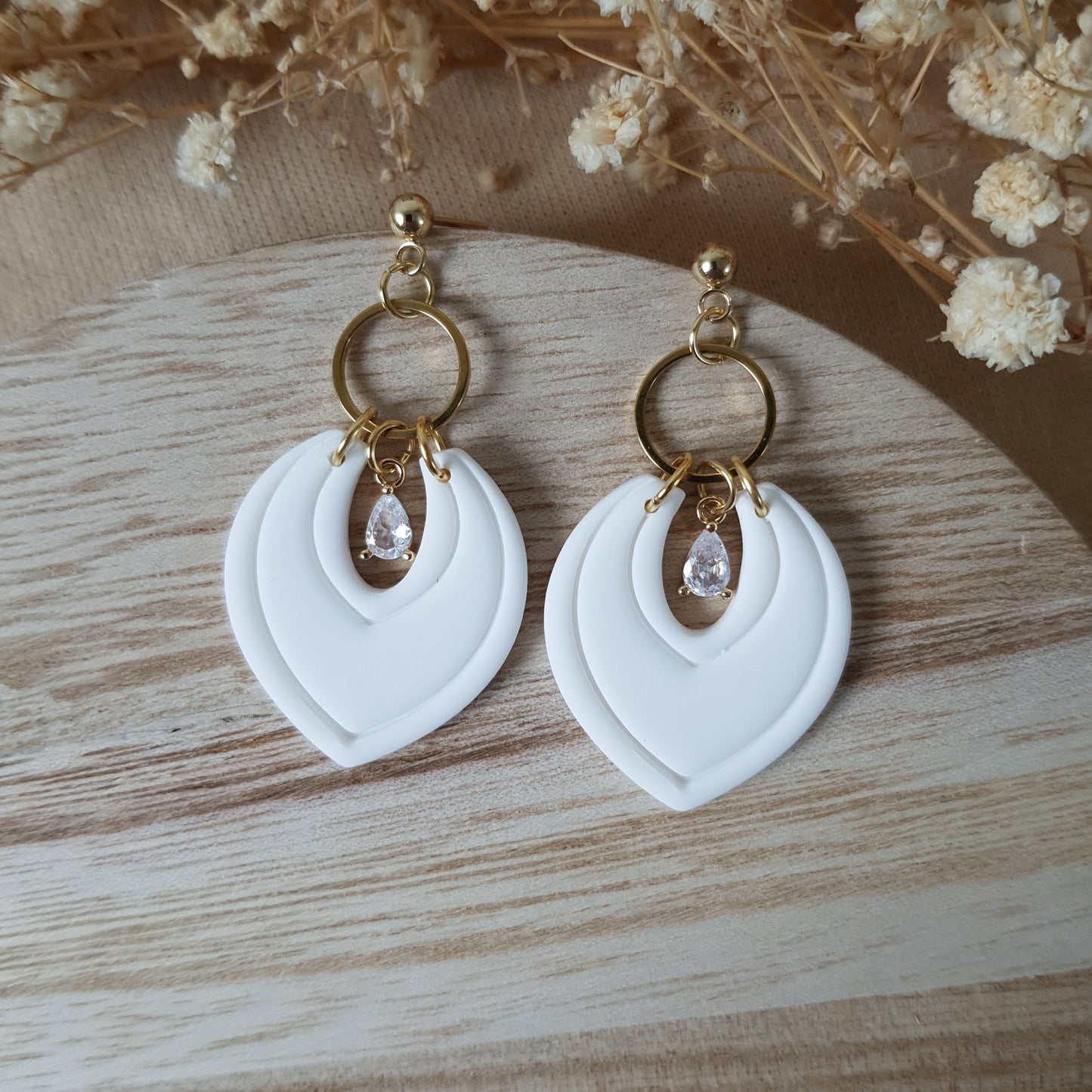 Elegant white dangle earrings