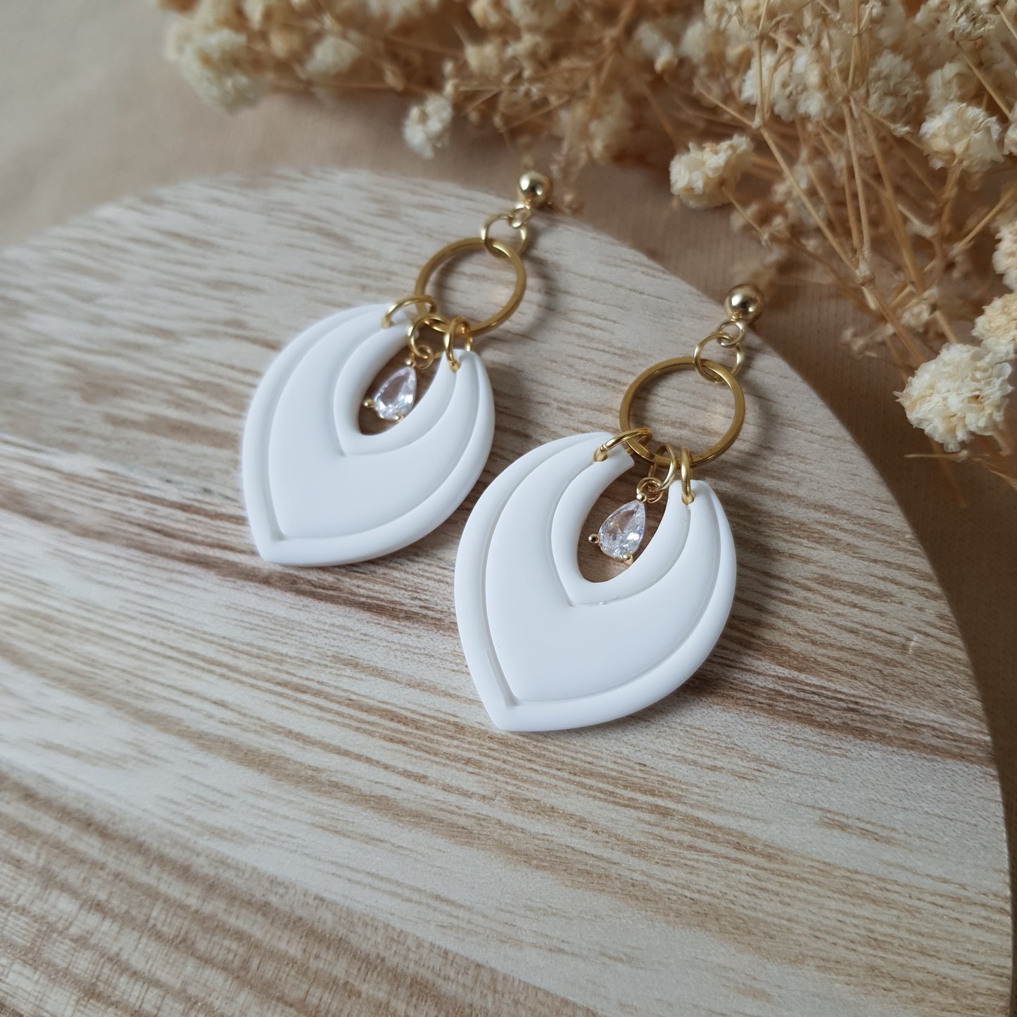 Elegant white dangle earrings