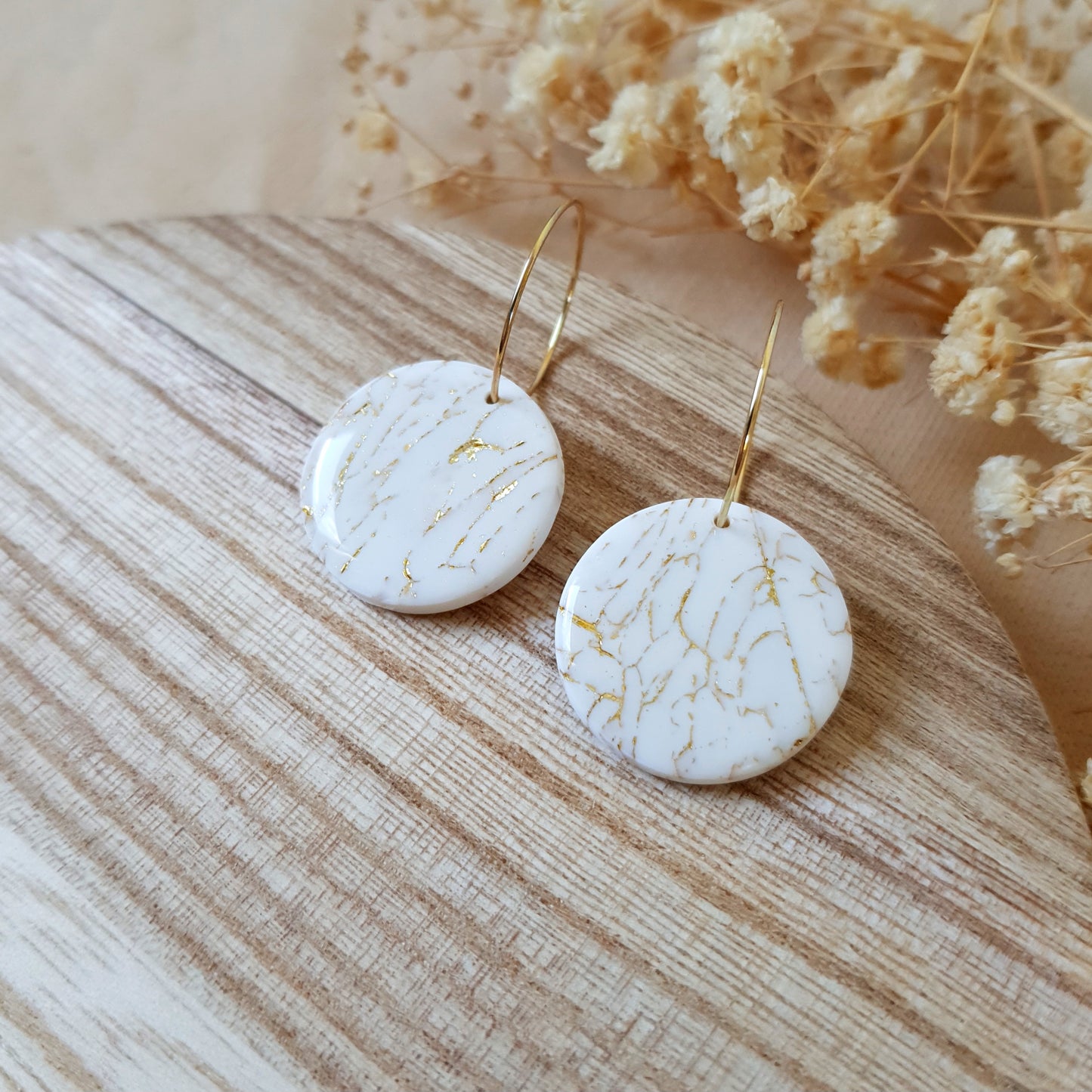 White and gold cracked hoops