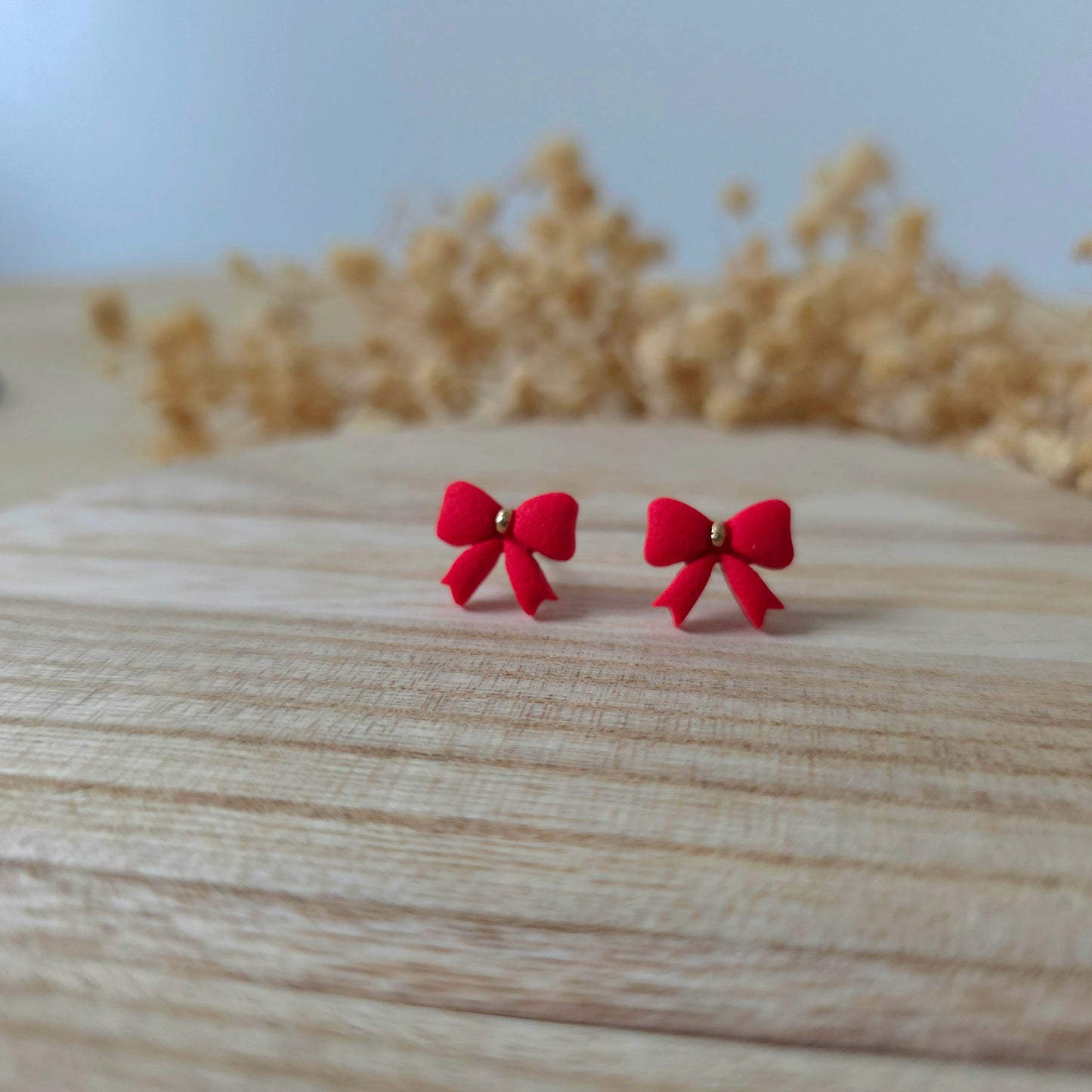 Mini red bow stud earrings