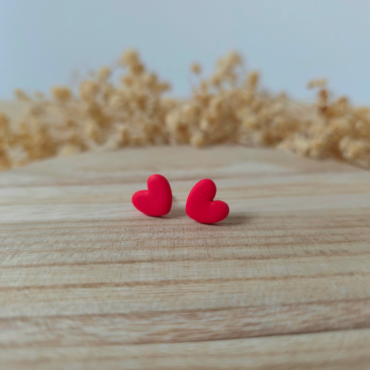 Red heart stud earrings