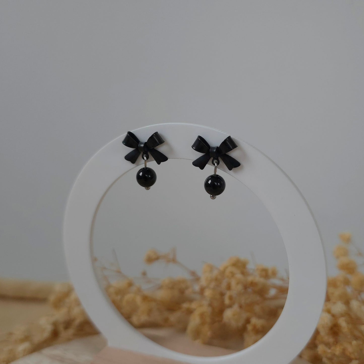 Black bow and onyx earrings
