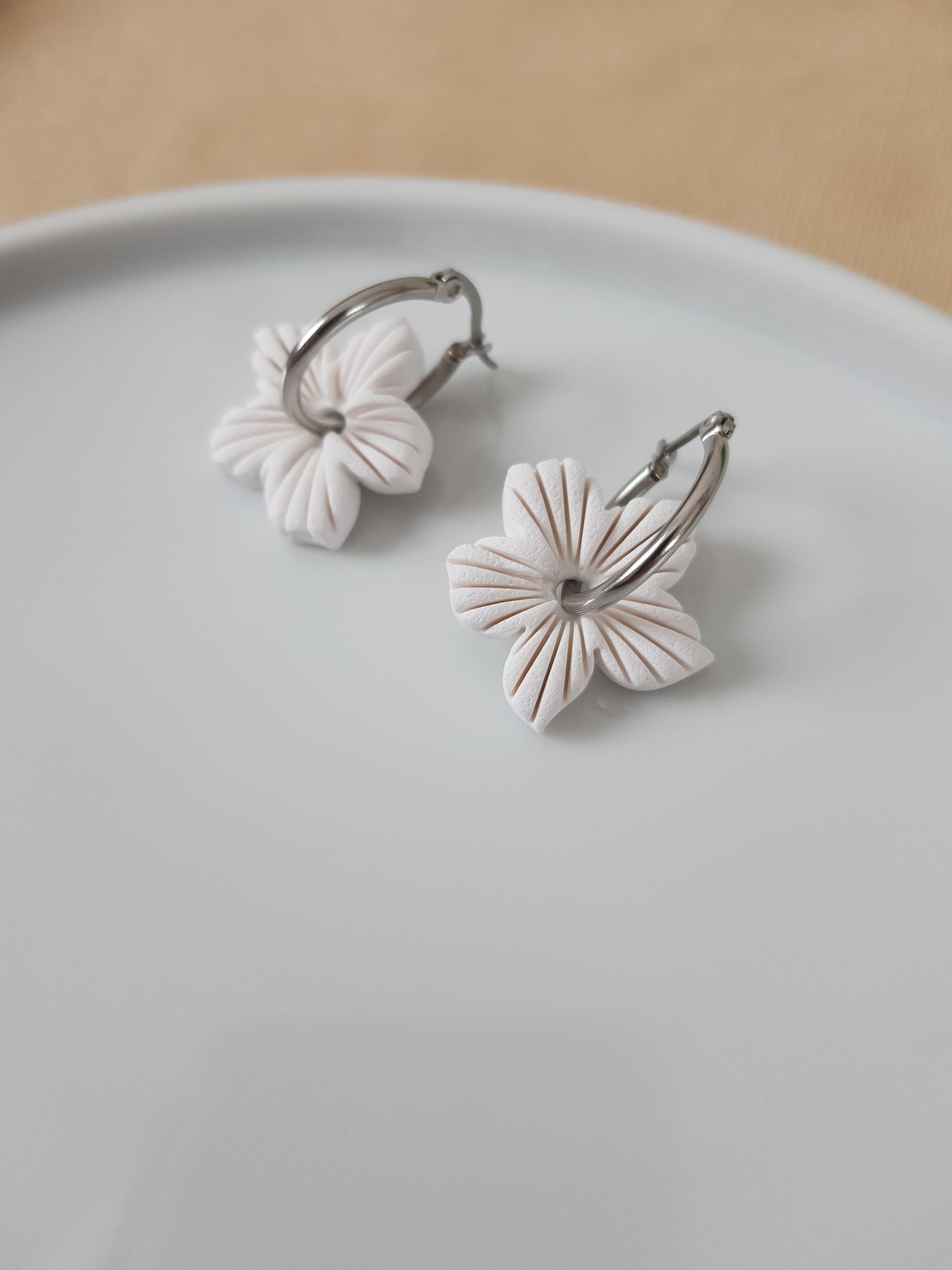 White flower charm earrings