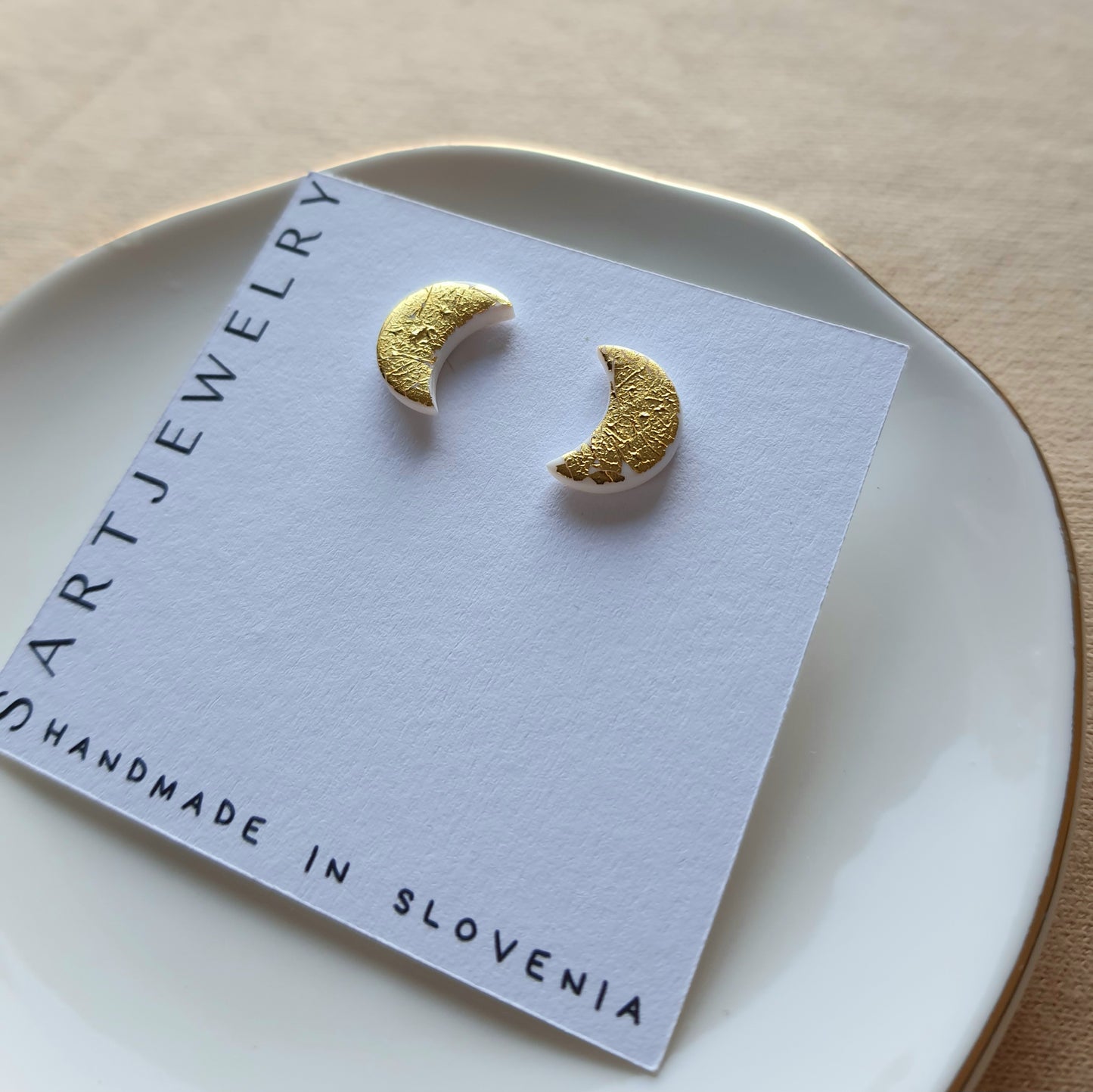 White moon with golden flakes stud earrings