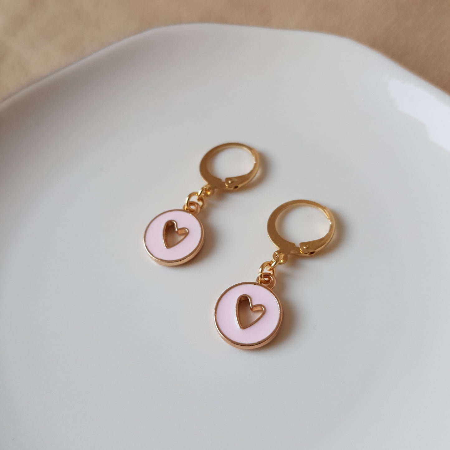 Pink and gold heart dangle earrings