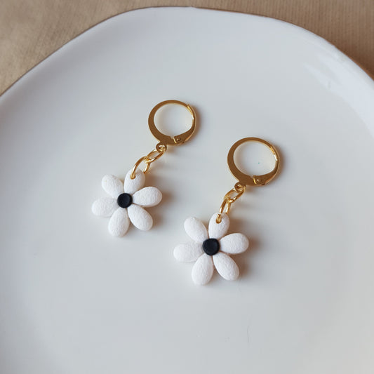 White flowers on hoops