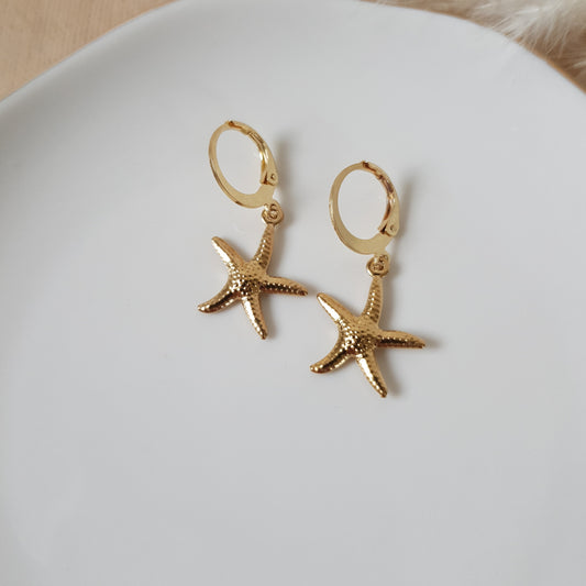 Gold sea star hoop earrings