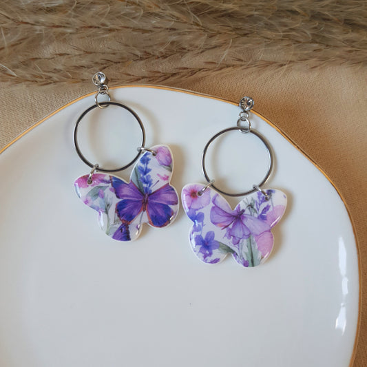 Violet butterfly dangle earrings