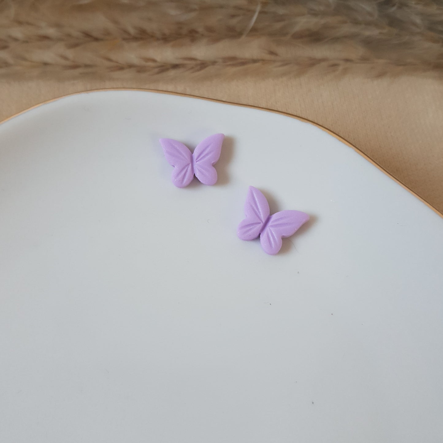 Violet butterfly studs