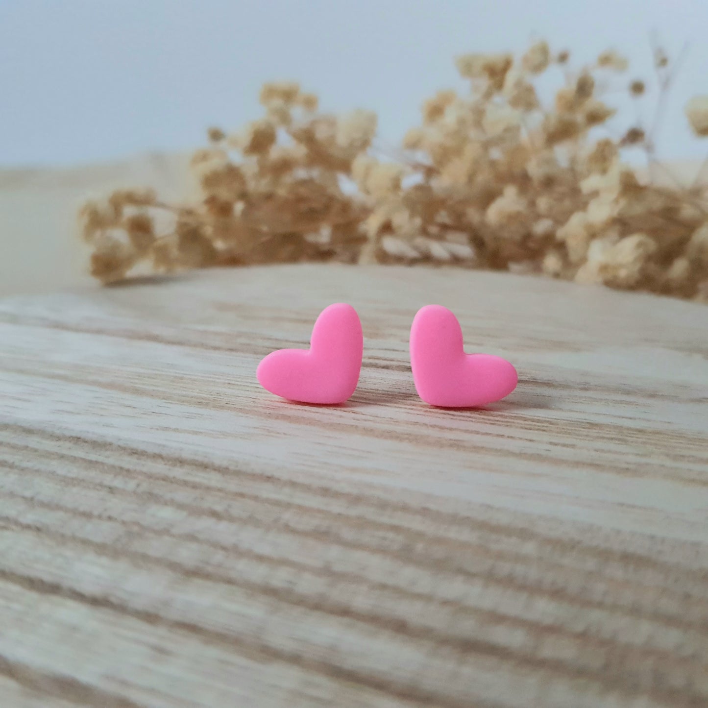 Neon pink heart earrings