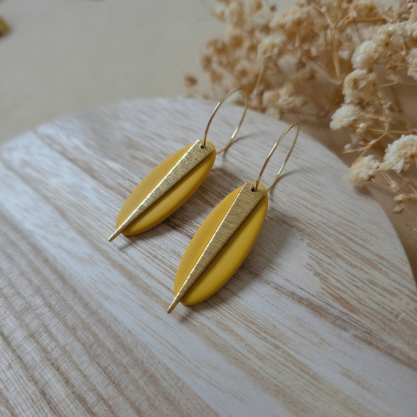 Uhani sončni žarek