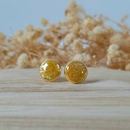 Golden sun studs