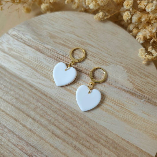 Viseči uhani beli srčki