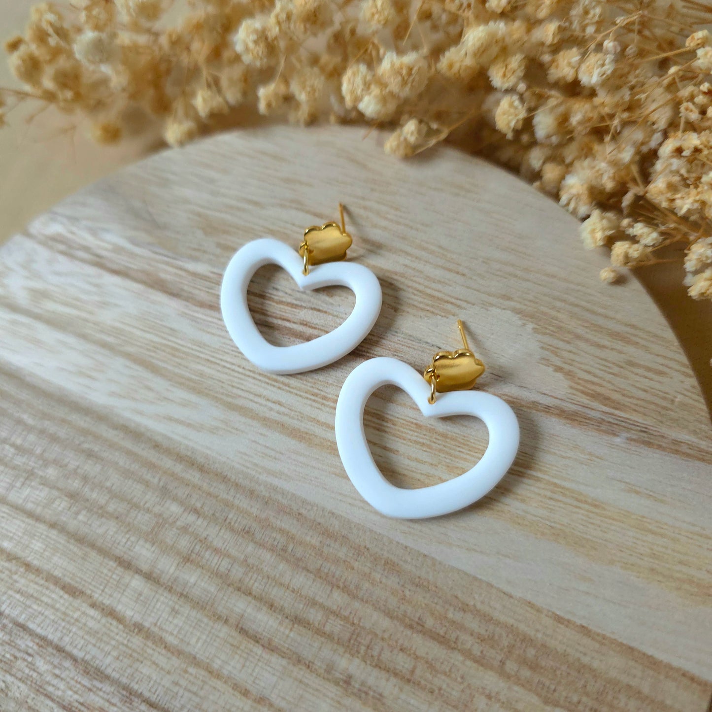 Beli široki viseči srčki