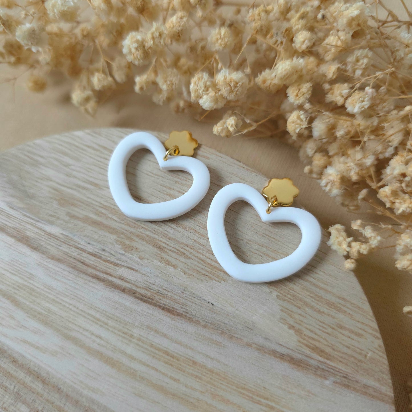 Beli široki viseči srčki