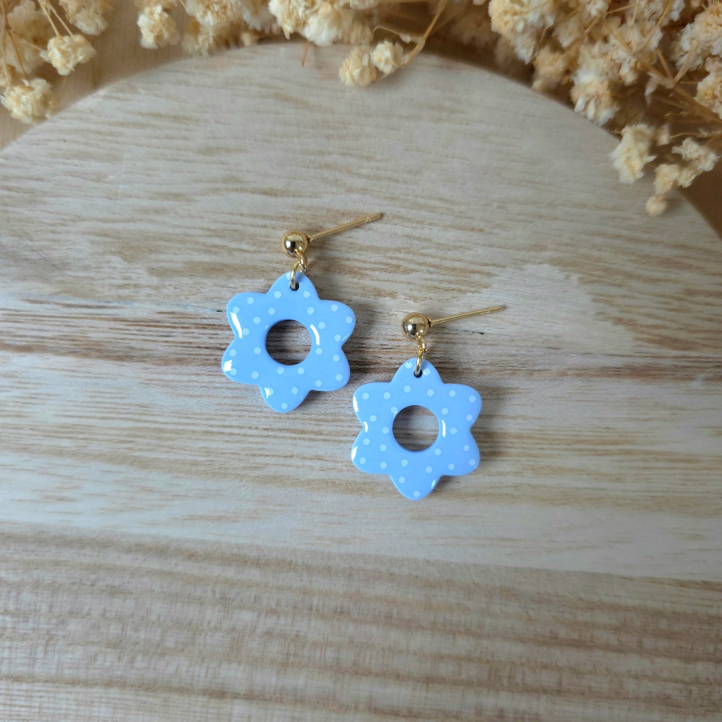 Light blue spotted donut flower earrings