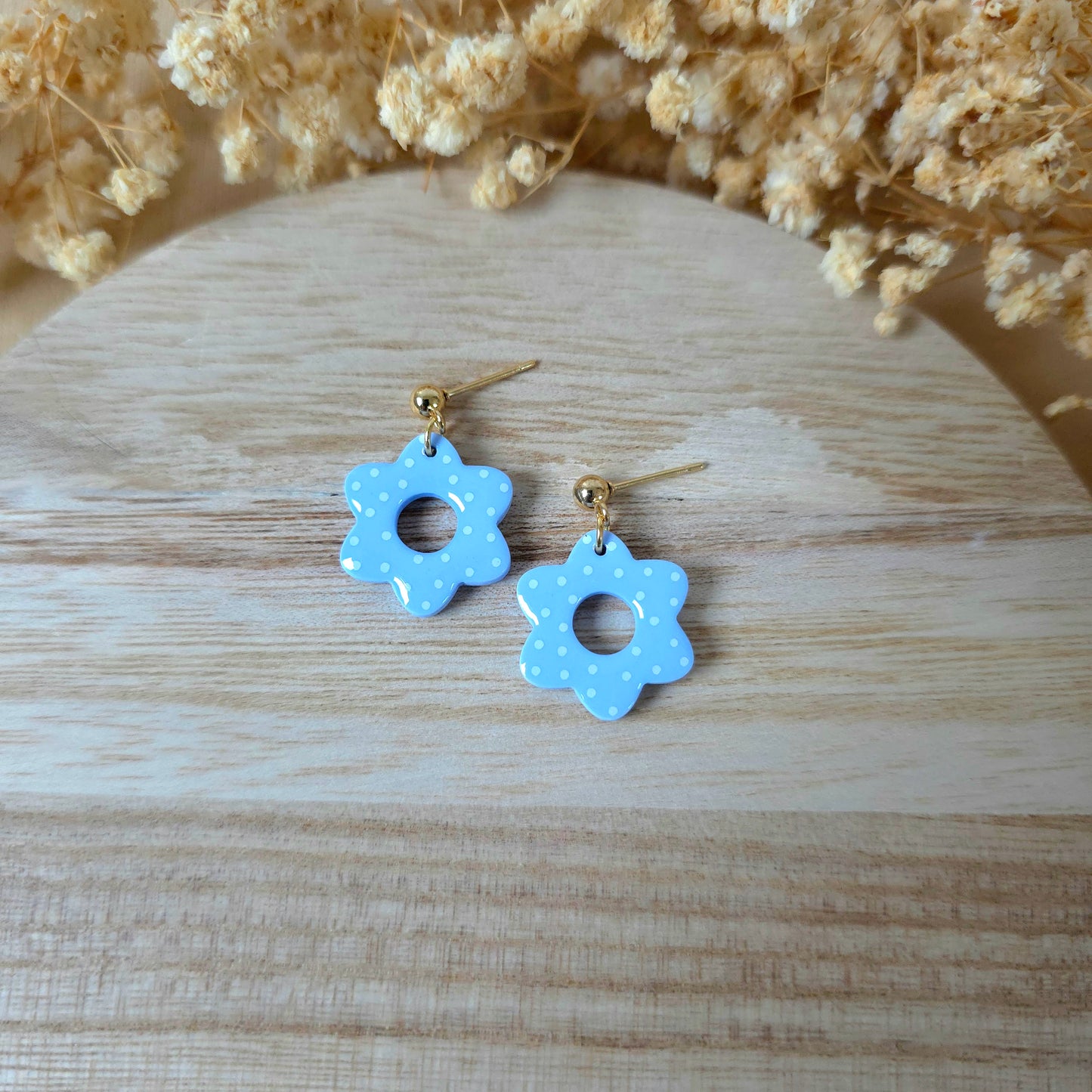 Light blue spotted donut flower earrings
