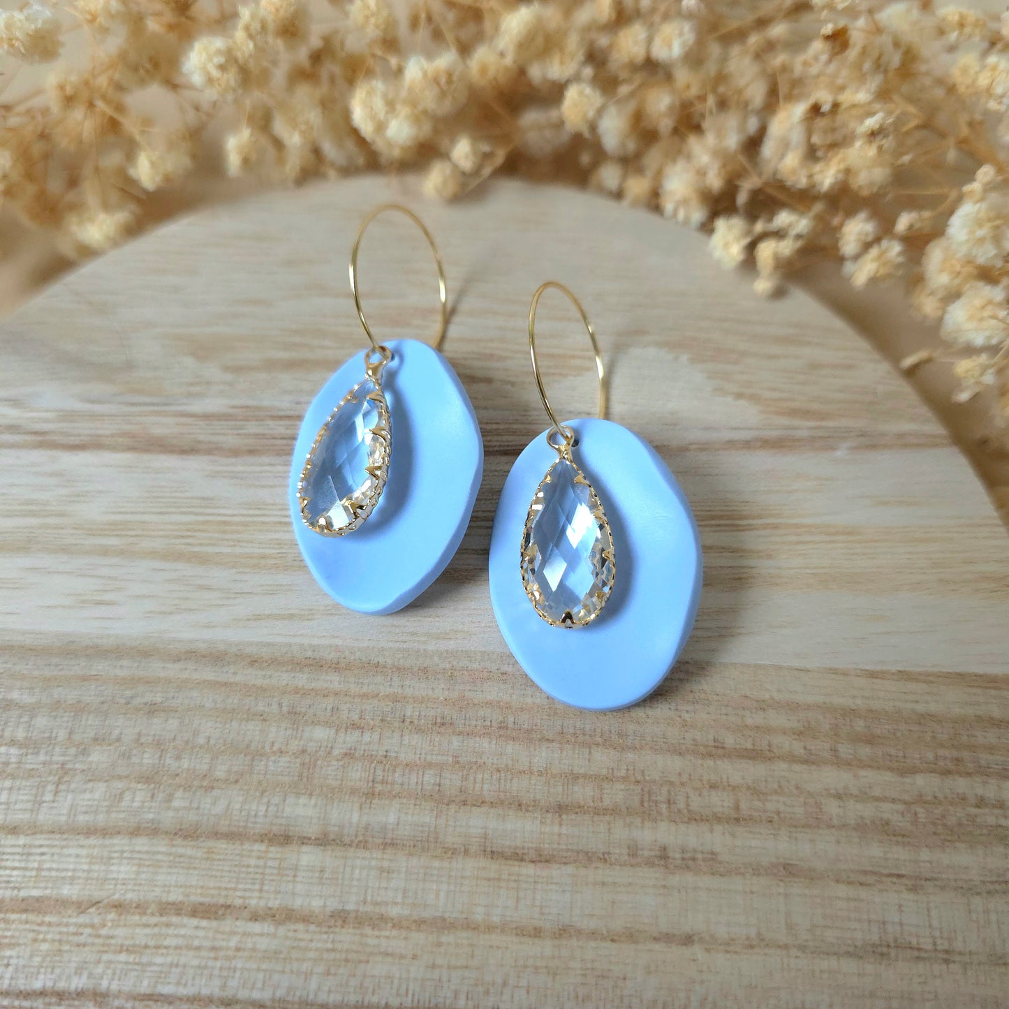 Crystal oval blue hoop earrings