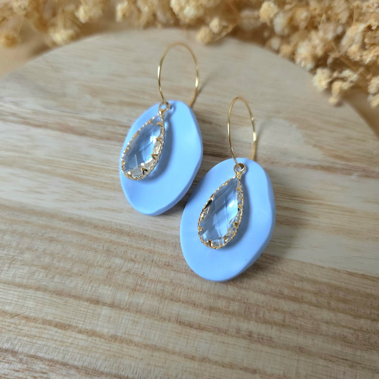 Crystal oval blue hoop earrings